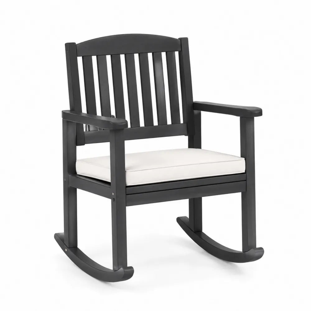 Chaise à bascule extérieure en bois composite noir avec coussin blanc