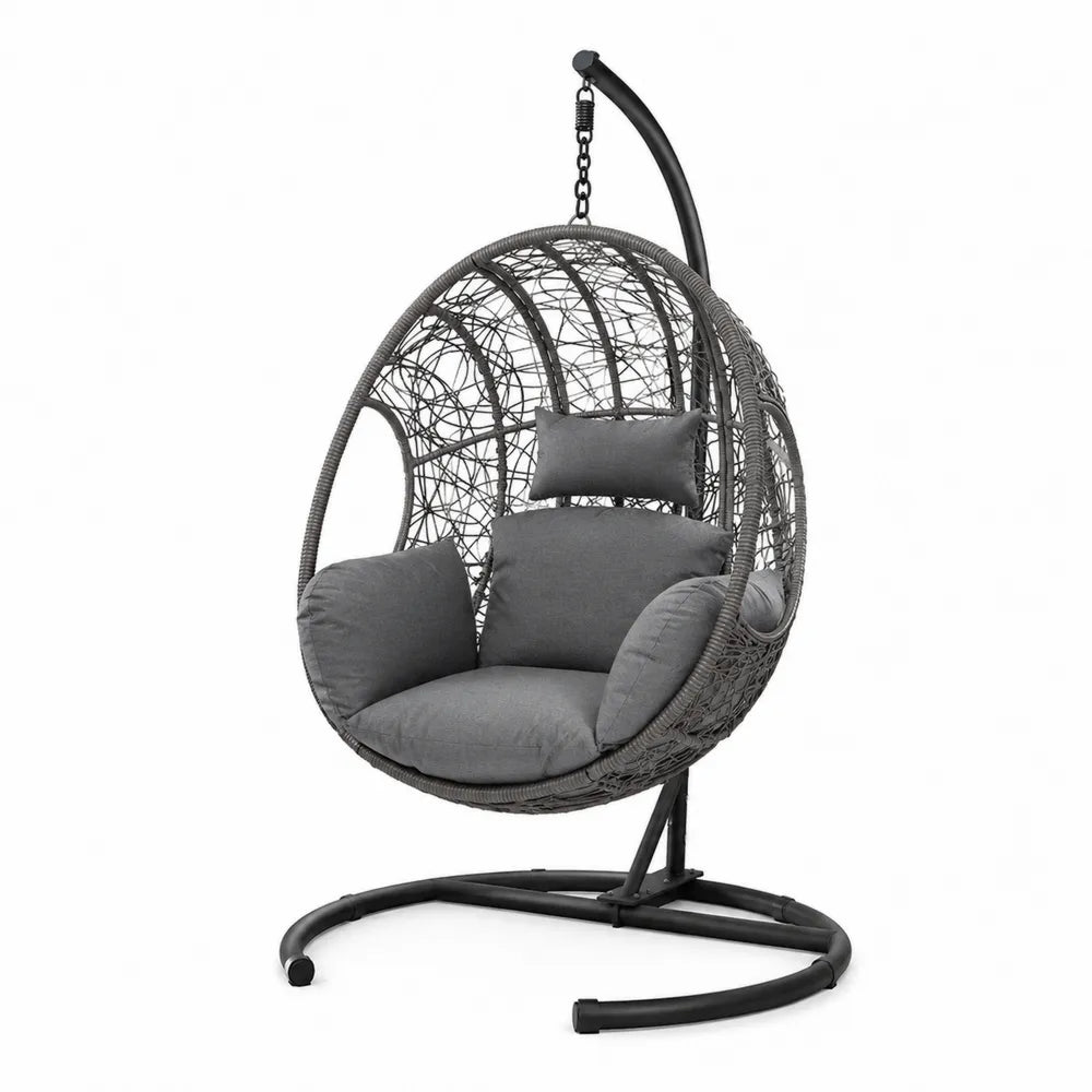 Fauteuil suspendu en résine tressée grise avec coussins