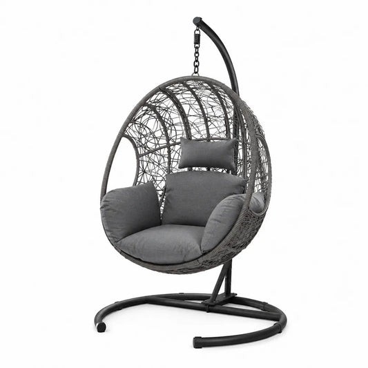 Fauteuil suspendu en résine tressée grise avec coussins